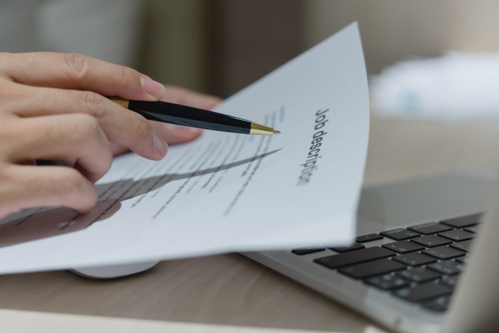 person reading a job description