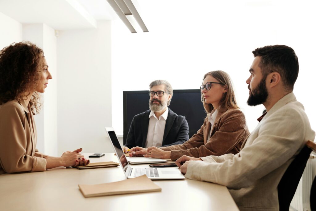 Direct marketing recruiters interviewing an applicant.