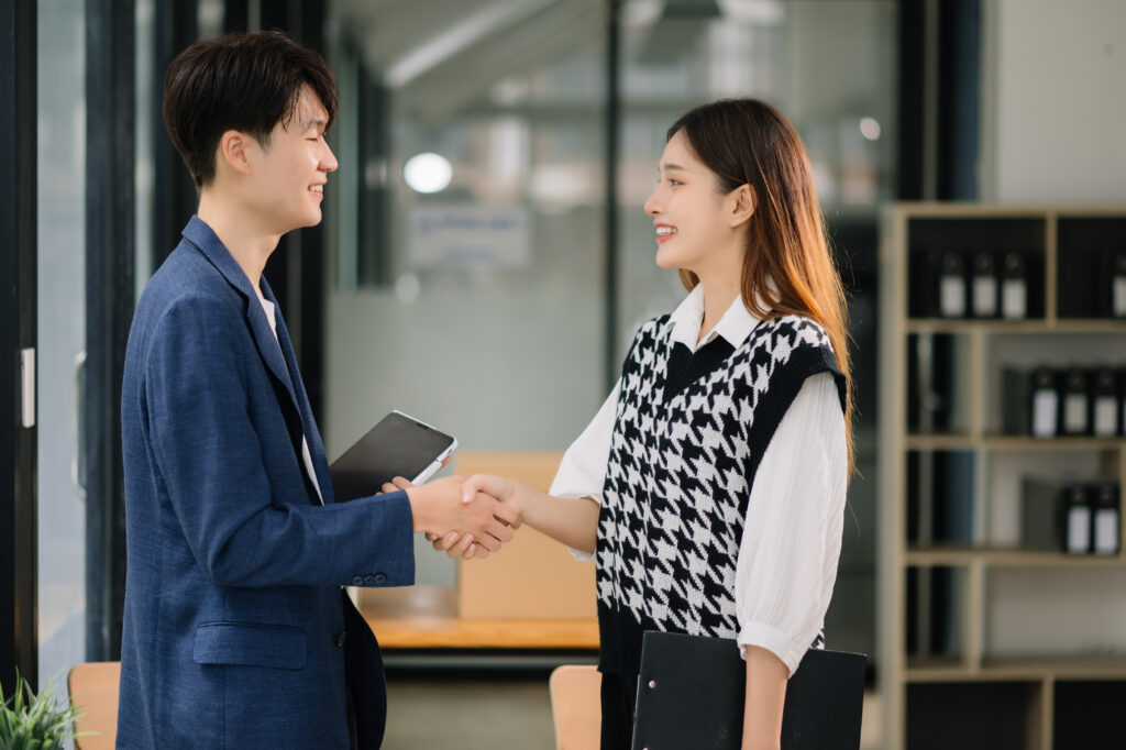 Professionals connect face-to-face, showcasing the personal approach that defines effective direct selling.